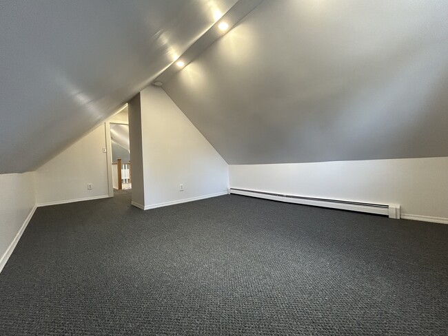 Bedroom with walk in closet. - 10 Everett St