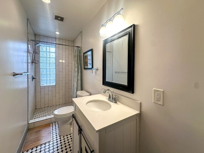 Building Photo - A home where old-world charm meets modern sophistication!