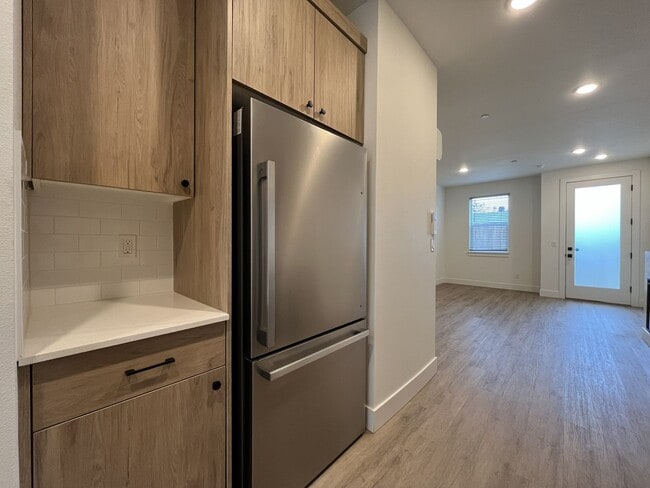 Building Photo - Modern 2-Bed, 1.5-Bath Condo with Custom Kitchen, Private Patio, and Prime Location