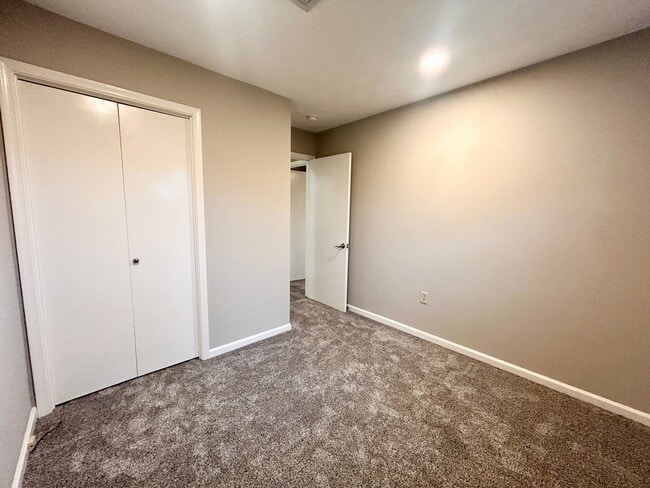 Building Photo - Spacious 4-Bedroom Home with Large Yard & Garage!