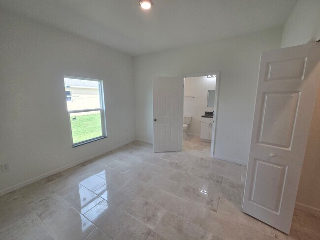 Building Photo - BRAND NEW 2/2/1-SW LEHIGH ACRES