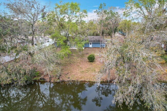 Building Photo - Stunning Waterfront Home located in the de...