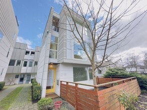 Building Photo - 3 Bedroom Central District Townhome w/ Garage, AC & Rooftop Deck