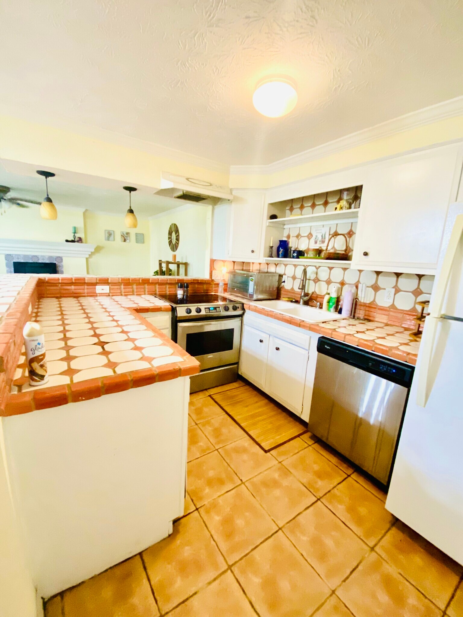 large galley kitchen with original tile - 110 B St
