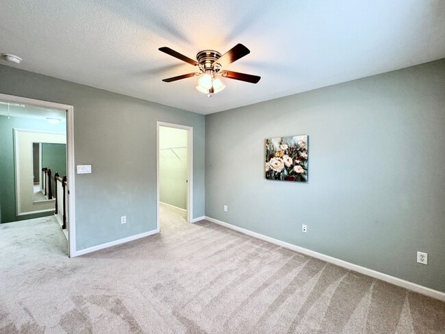 Building Photo - READY NOW!! End-Unit Loft-Style Condo w/1s...
