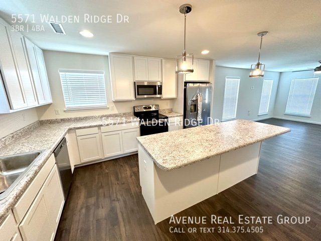 Building Photo - Modern 3-Bed Townhome at Walden Ridge – Do...