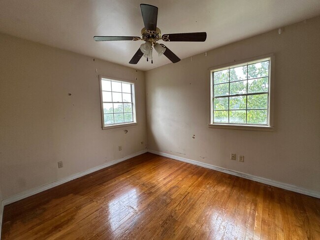 Building Photo - Available July 1st***Welcome to this charming 4-bedroom, 2-bathroom home located in the heart of ...