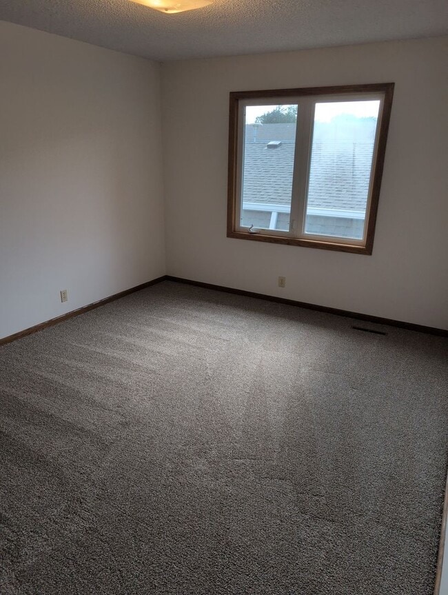 Building Photo - Fully Updated 3 Bedroom 3 Bath Townhouse with 2 Stall Attatched Garage