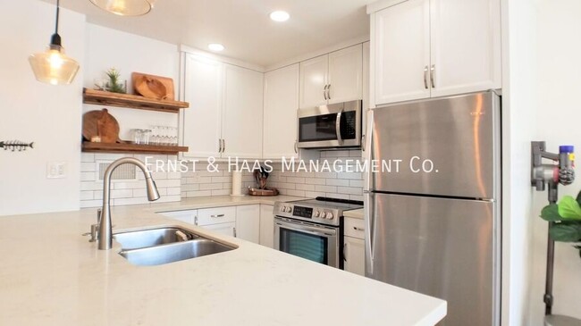 Building Photo - Beautifully Remodeled Condo Located in Pri...