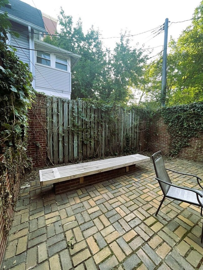 Building Photo - One Block to the Diag! Charming Home with Private Courtyard + Parking