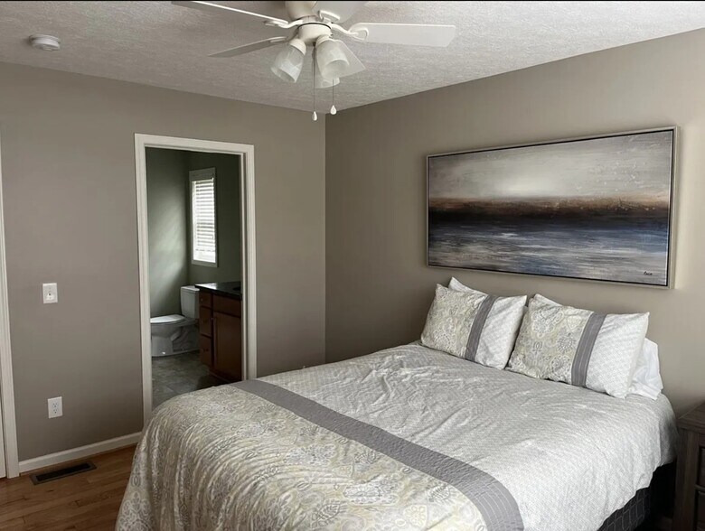 master bed with walk ing closet and master bath - 8388 Bay St