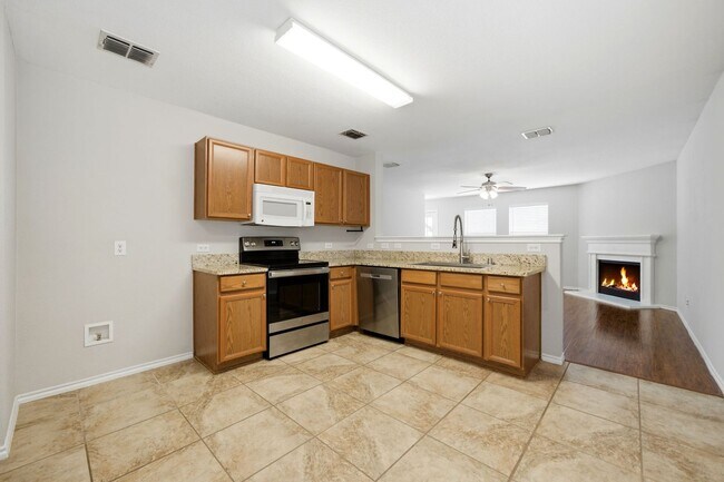 Building Photo - Easy Living with Wood Floors & Fireplace – Royse City, TX