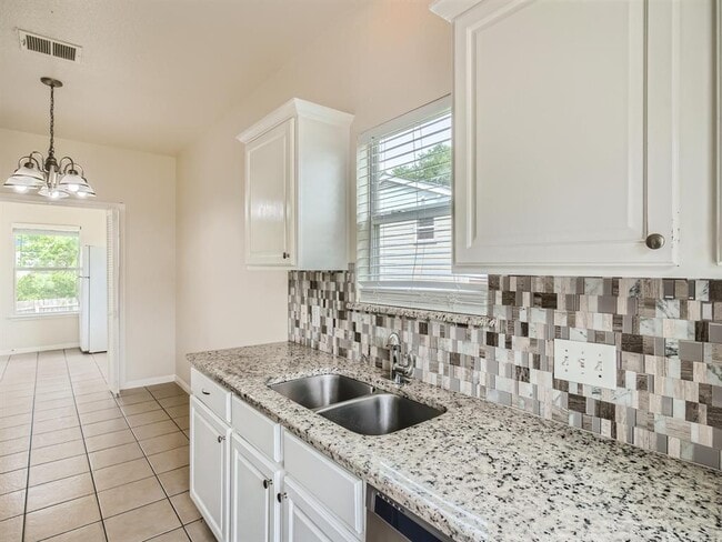 Building Photo - 6102 Reicher Dr