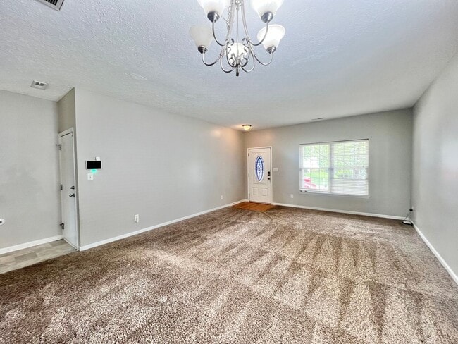 Building Photo - Charming 4BD, 2.5BA Durham Home with a Bonus Sun-Room & Fenced In Yard Only 10 Minutes Away from ...