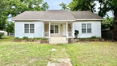Building Photo - Spacious 3 Bedroom Home with Modern Updates & Shop