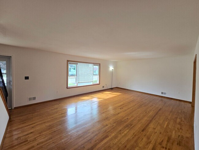 Building Photo - Updates abound at this SPACIOUS, half duplex with 3+ off-street parking spots, 3-bedrooms and 2 f...