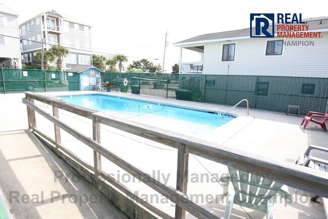 Building Photo - Year Round Fully Furnished Ocean View Condo on Carolina Beach