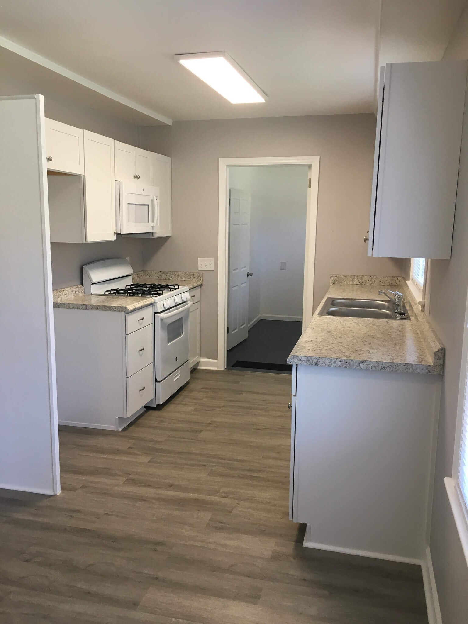 Kitchen looking into Laundry Room - 110 Gilliland Ave