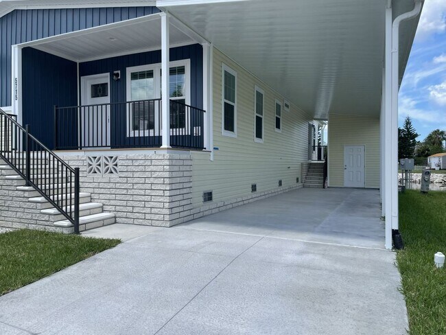 Building Photo - 5715 Blue Harbor Dr