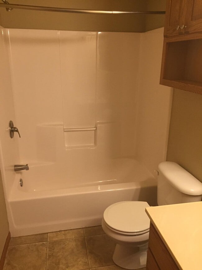 Building Photo - $1700 - 3 Bedroom, 2 Bathroom Townhome - Garage and Large Yard!