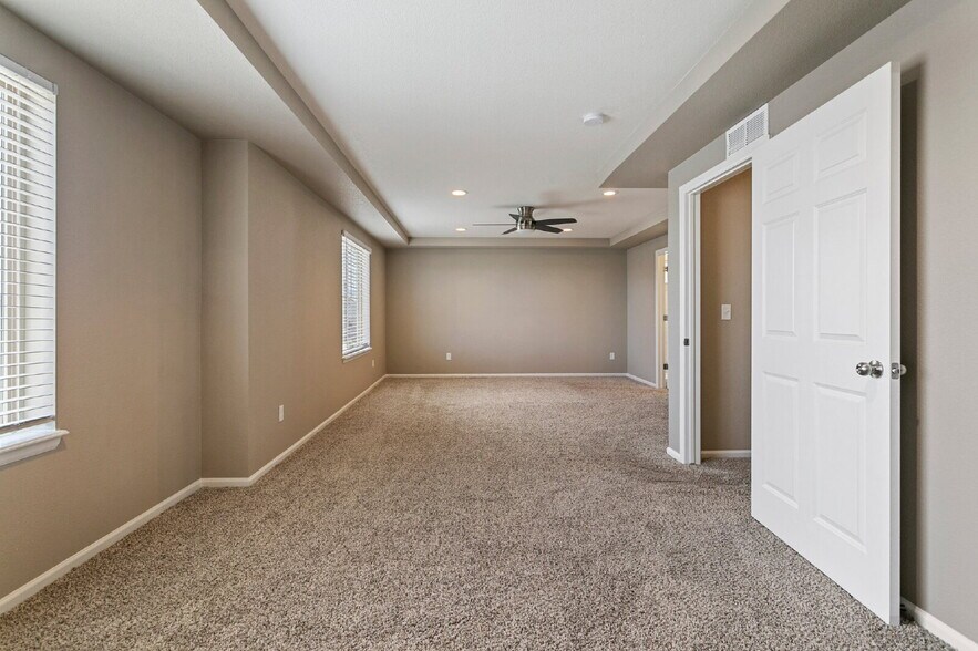 Building Photo - Spacious Banning Lewis Home with Finished ...
