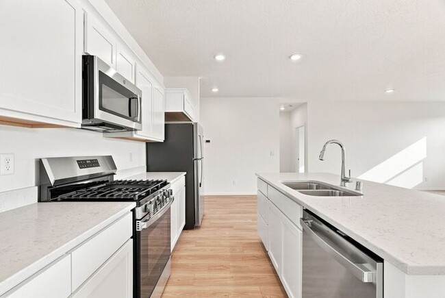 Building Photo - Modern 4-Bedroom Home with a 3-Car Garage & Covered Patio