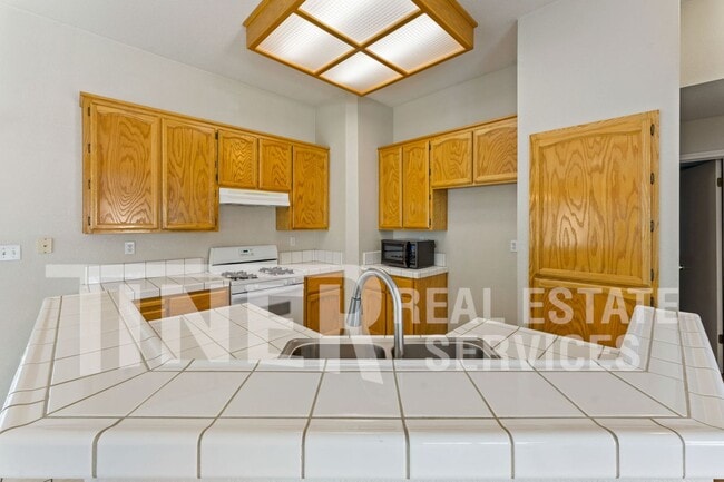 Building Photo - 8560 Harvest House Way