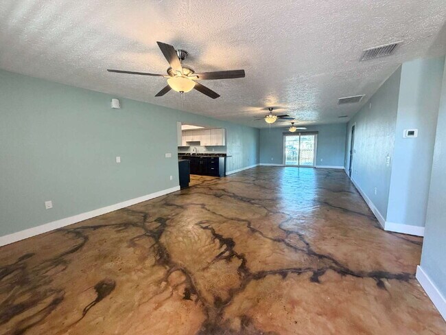 Building Photo - "Waterfront Home with Dock! 3-Bedroom Oasis with 2 Baths and 1,800 Sq Ft of Comfort in Hudson, FL!"
