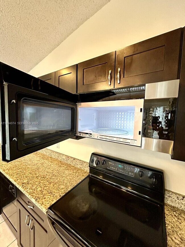 Building Photo - 4779 NW 5th Ct