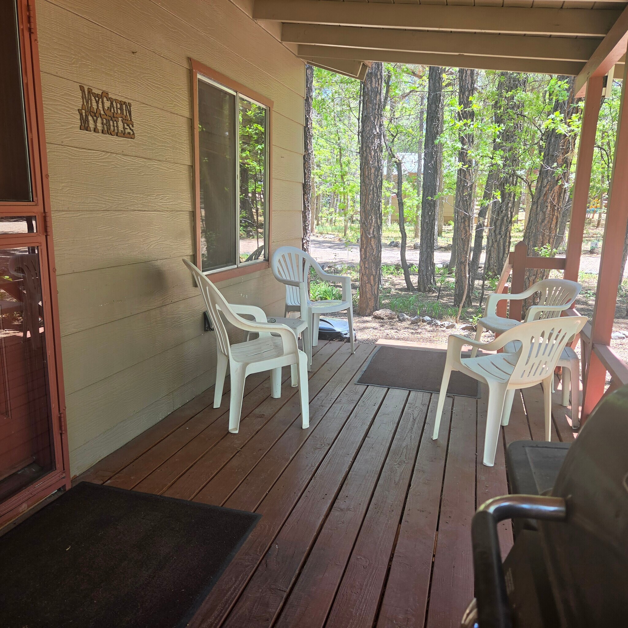 Cabin 7 Porch - 165 E White Mountain Blvd