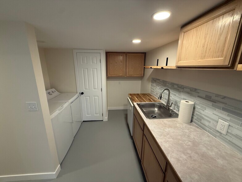 Large Cabinets and open kitchen space to make your own - 5454 45th Ave SW