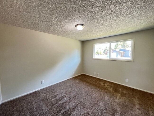 Building Photo - Beautifully Landscaped Two Bedroom