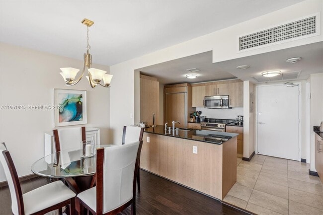 Building Photo - 10275 Collins Ave