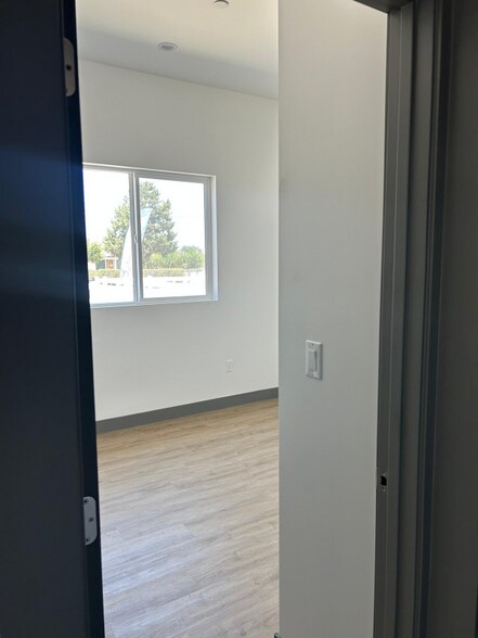 Building Photo - 9228 E Ave T 6