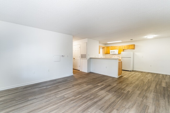 Living Room With Kitchen - Reynolds Place Apartments