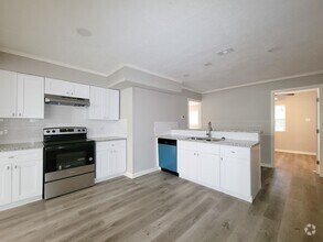 Building Photo - REMODELED AND UPDATED 4 BEDROOM 2 BATH LEA...