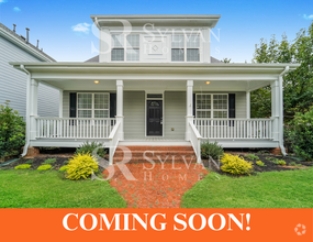 Building Photo - Welcome to this charming abode.