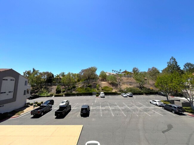 Building Photo - 1BR Condo with Private Balcony, Central A/C & Community Amenities in Corona