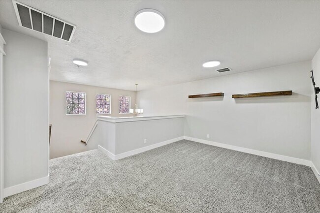 Building Photo - Stylish 4-Bed + Loft Just Minutes from The...