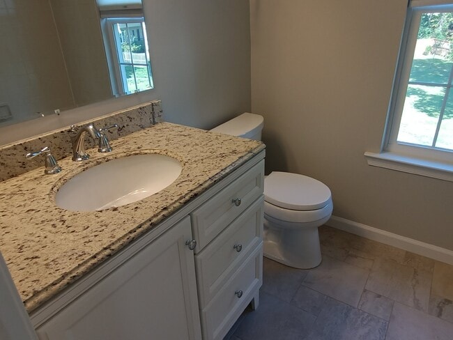 Building Photo - This charming 1,732-square-foot single-family home offers 3 bedrooms and 3 bathrooms, featuring a...