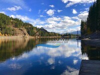Building Photo - Riverfront Home on .62 acre Lot with Dock ...
