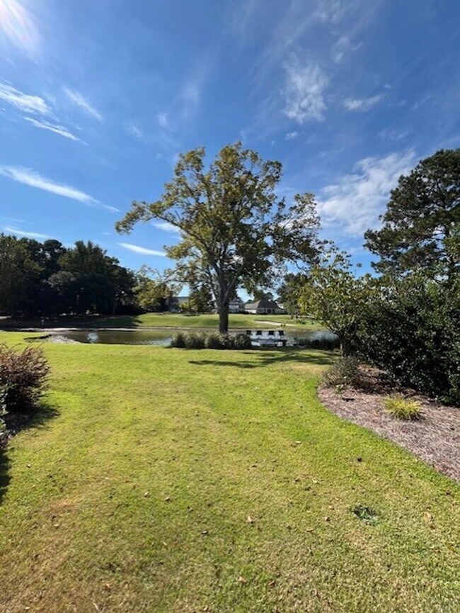 Building Photo - Welcome to Elegant Living in the Charming Porters Neck Plantation Community!