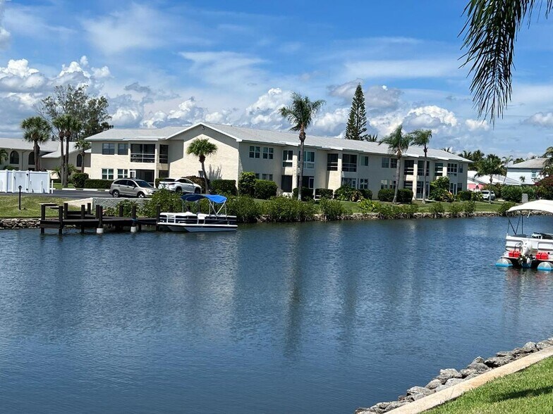 Rear of Condo (second floor) second from left - 1860 Robalo Dr