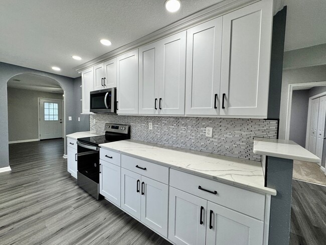 Building Photo - Fully-Updated 1st-Time Rental! Ready NOW! Pet Friendly w/Large, Detached Garage Workshop!