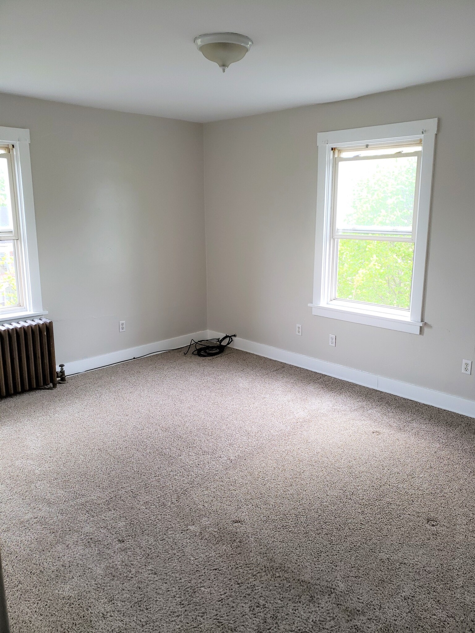 Bedroom #1 painted in Behr Agreeable Grey - 201 Richbarn Rd