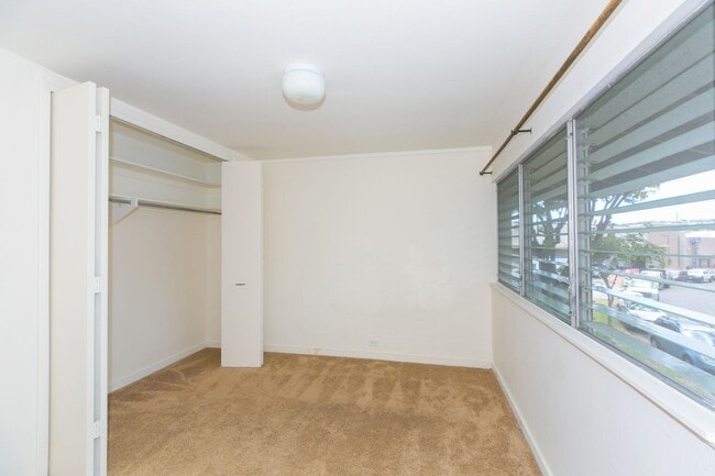 Building Photo - Tropic Garden Townhouse 2b1.5b1pkg