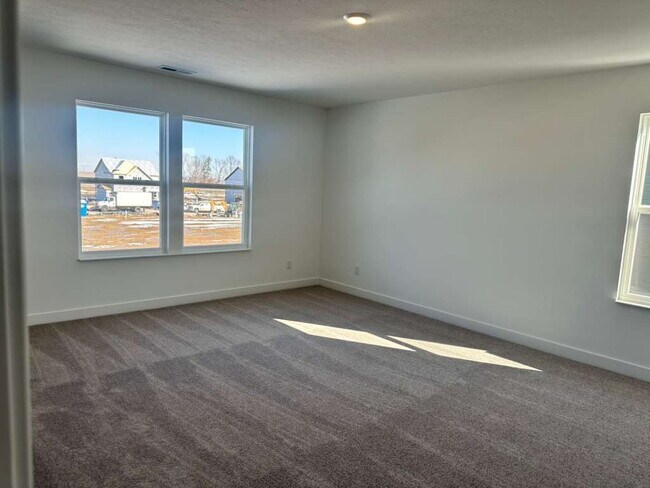 Building Photo - Beautiful new construction featuring 4 bedrooms and 2.5 baths, ideally located just minutes from ...