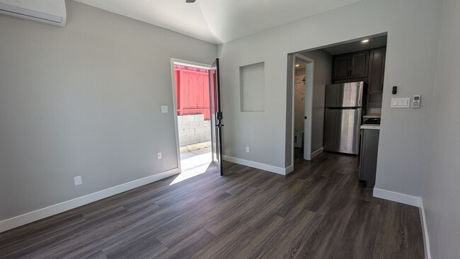 Building Photo - Fenced Private Yard in Newer Build Studio ...