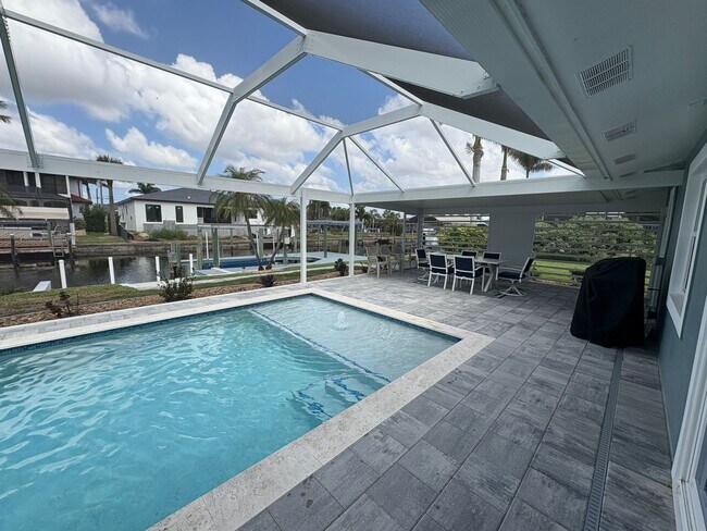 Building Photo - Beautifully Furnished Pool Home with Boat ...