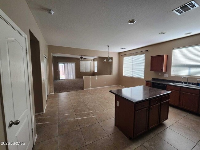 Building Photo - 7643 W Charter Oak Rd